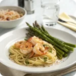 Plated shrimp scampi dinner with asparagus